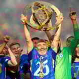 Chelsea manager Enzo Maresca lifts the Club World Cup trophy