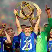 Chelsea manager Enzo Maresca lifts the Club World Cup trophy