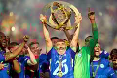 Chelsea manager Enzo Maresca lifts the Club World Cup trophy