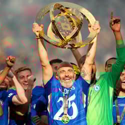 Chelsea manager Enzo Maresca lifts the Club World Cup trophy