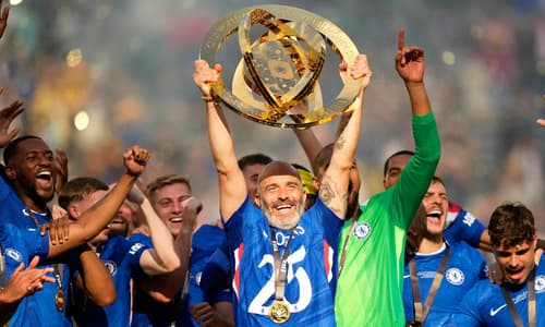 Chelsea manager Enzo Maresca lifts the Club World Cup trophy