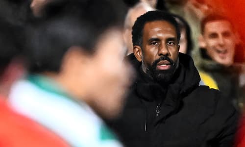 Celtic manager Wilfried Nancy watches his side's clash with Dundee United