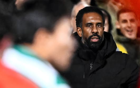 Celtic manager Wilfried Nancy watches his side's clash with Dundee United