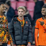 EINDHOVEN l Netherlands midfielder Ryan Gravenberch, Netherlands midfielder Kenneth Taylor, and Netherlands defender Jorrel Hato during the UEFA Nations League match between the Netherlands and Serbia at Philips Stadion on October 4, 2026, in Eindho...