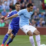 23 May 2013: Karim Rekik (right)(NED) of Manchester City shields the ball from Cesar Azpilicueta (28)(ESP) of Chelsea. Chelsea F.C. was defeated by Manchester City 3-4 at Busch Stadium in Saint Louis, Missouri, in a friendly exhibition soccer match....