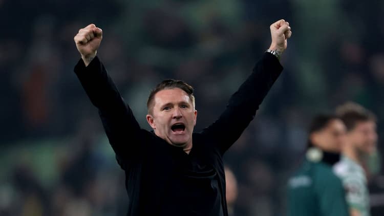 Robbie Keane celebrates Ferencvaros' Europa League win over Rangers