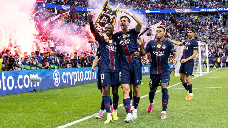 Ousmane Dembele and Fabian Ruiz celebrate PSG's goal in the 2025/26 Champions League final against Arsenal
