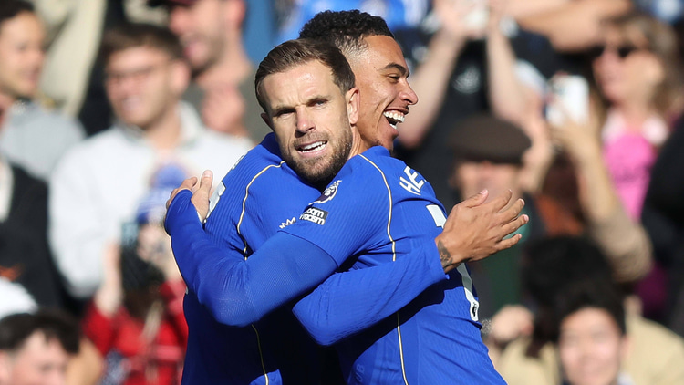 Jordan Henderson with Morgan Rogers