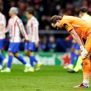 Tottenham goalkeeper Antonin Kinsky reacts to making a mistake against Atletico Madrid in the Champions League