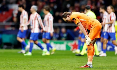 Tottenham goalkeeper Antonin Kinsky reacts to making a mistake against Atletico Madrid in the Champions League