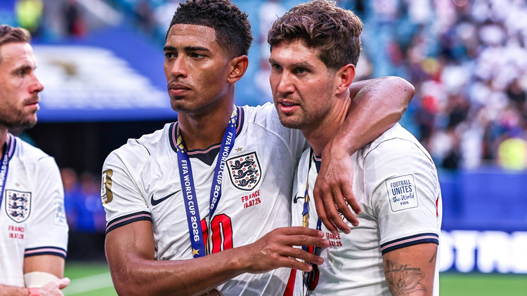 Stones (r) with Jude Bellingham at the World Cup