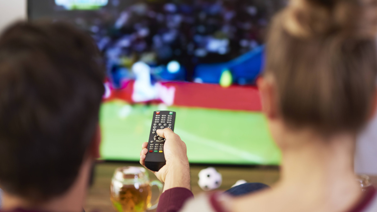 Football watching, stock image