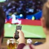 Football watching, stock image