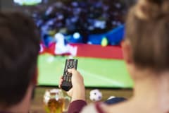 Football watching, stock image