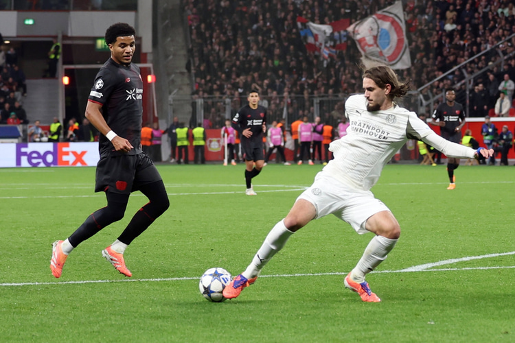 Malik Tillman (left) in action against his former club PSV