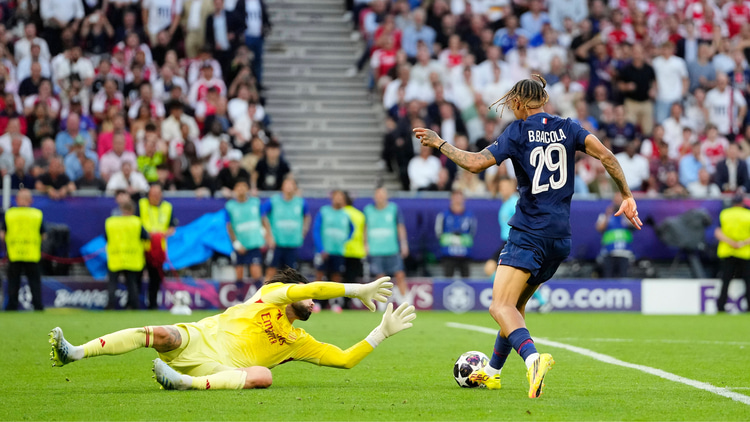 Bradley Barcola is denied by Arsenal goalkeeper David Raya in the Champions League final