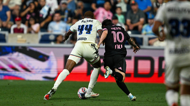 Neil Pierre in action against Inter Miami's Lionel Messi