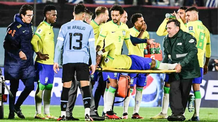 Neymar getting stretchered off against Uruguay