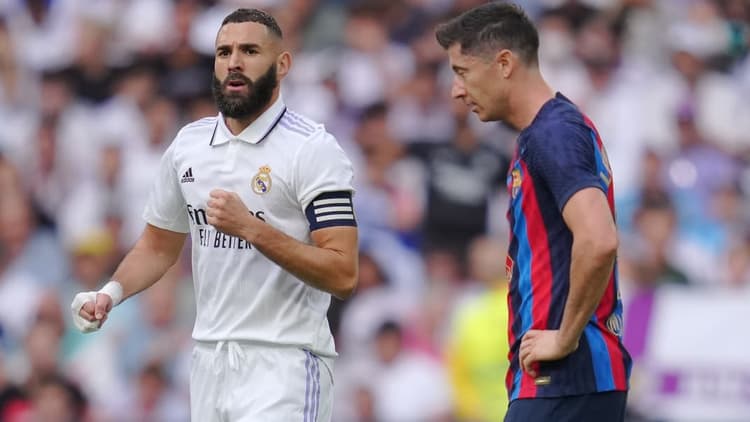 Robert Lewandowski (rechts) baalt na een treffer van Real Madrid.