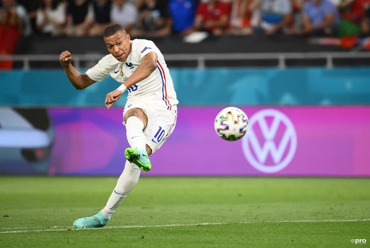 PSG striker Kylian Mbappe shoots towards goal in France's Euro 2020 match with Portugal