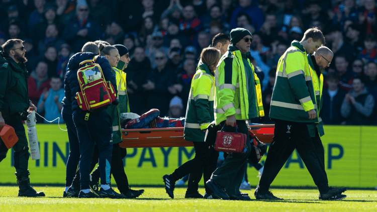 A player departing the pitch due to injury