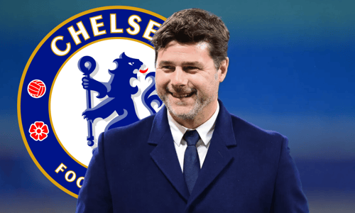 Smiling Mauricio Pochettino in front of Chelsea badge