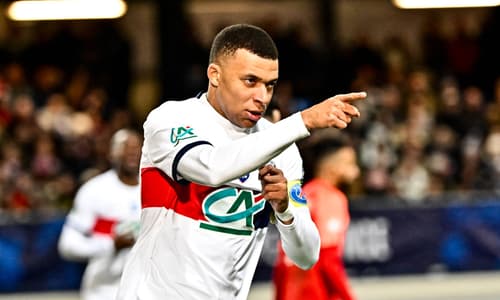 Kylian Mbappe celebrates scoring for PSG against Revel in the Coupe de France