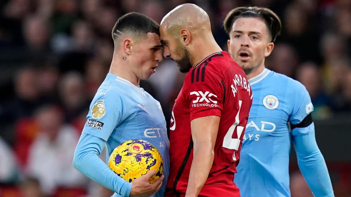 Phil Foden and Sofyan Amrabat clash in the Manchester derby
