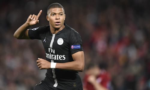 Kylian Mbappe celebrates scoring against Liverpool