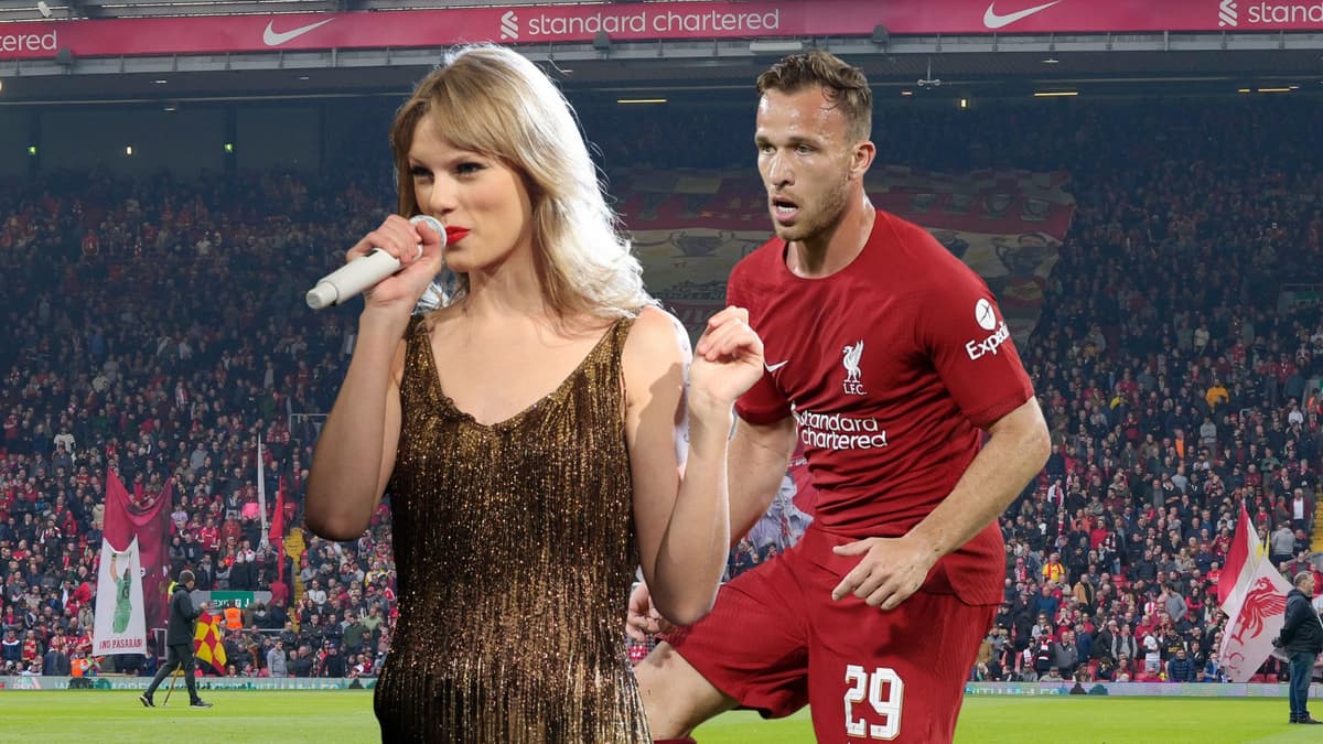 Taylor Swift and Arthur Melo in front of a view of the Kop at Anfield