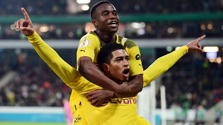 Moukoko celebrates a goal with Jude Bellingham