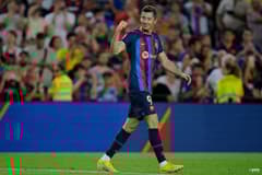 Robert Lewandowski celebrates a double for Barcelona against Valladolid