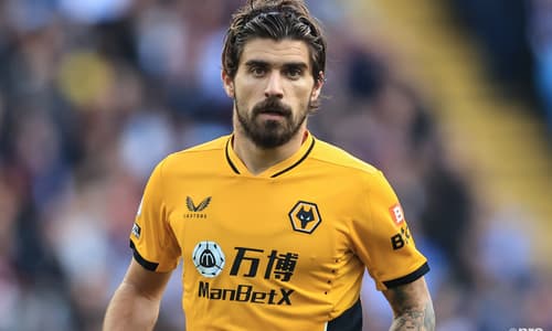 Ruben Neves playing for Wolves in a Premier League match against Aston Villa at Villa Park in 2021