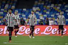 Juventus players dejected as they lose 2-1 to Napoli in Serie A