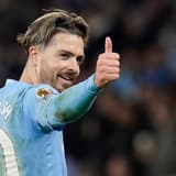 Jack Grealish gives the thumbs up during Man City's Premier League match with Aston Villa