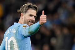 Jack Grealish gives the thumbs up during Man City's Premier League match with Aston Villa