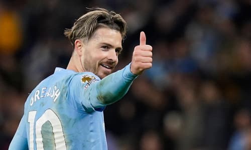 Jack Grealish gives the thumbs up during Man City's Premier League match with Aston Villa