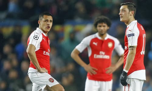 Alexis Sanchez and Mesut Ozil in action for Arsenal.