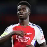 Bukayo Saka celebrates scoring for Arsenal against PSG in the Champions League