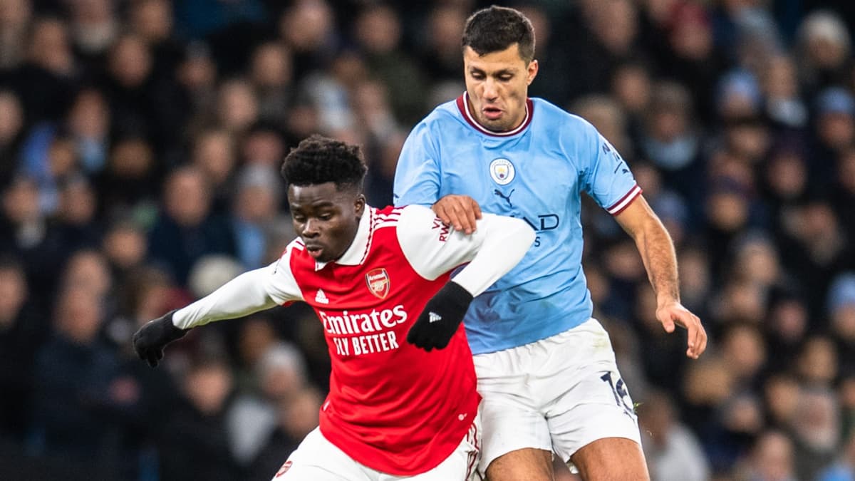 Bukayo Saka and Rodri during Arsenal vs. Man City in February.