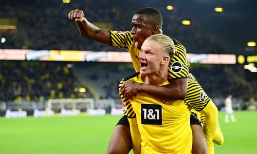 Dortmund's Erling Haaland celebrates a goal with Youssoufa Moukoko