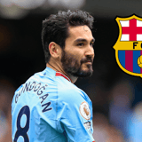 Ilkay Gundogan of Manchester City, next to the Barcelona badge
