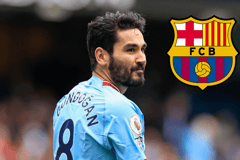 Ilkay Gundogan of Manchester City, next to the Barcelona badge