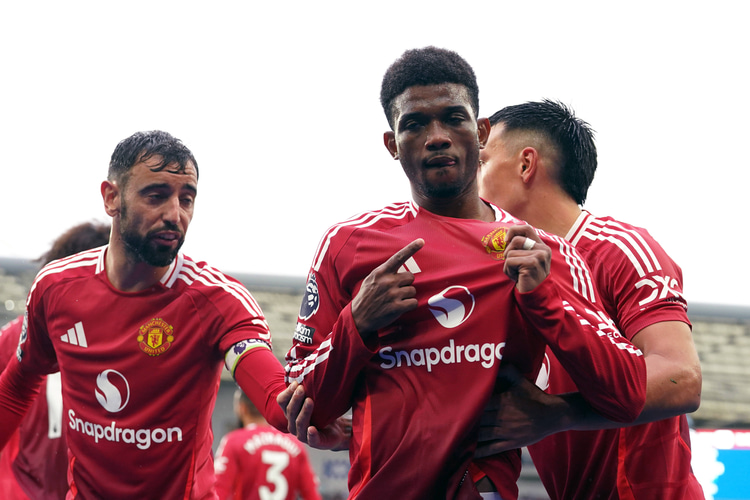 Amad Diallo celebrates a goal against Brighton