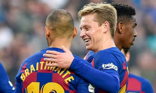 Martin Braithwaite and Frenkie de Jong in action for Barcelona.