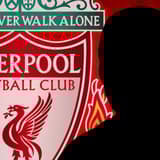 A silhouette of Moises Caicedo and the Liverpool badge on a red abstract background