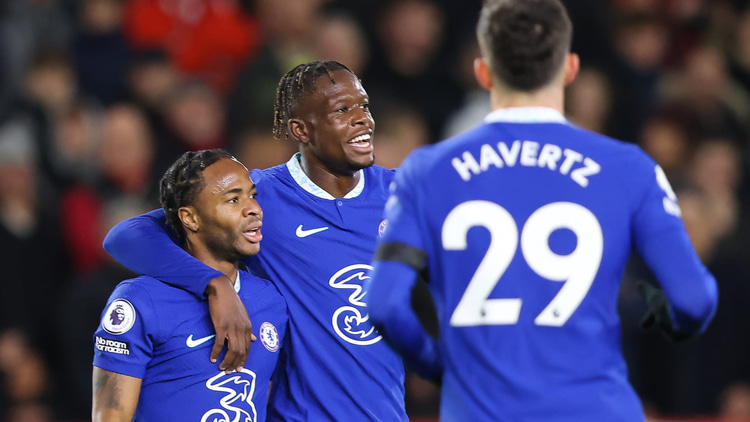 Denis Zakaria celebrating with Raheem Sterling