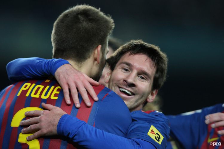 Piqué en Lionel Messi bij Barcelona.