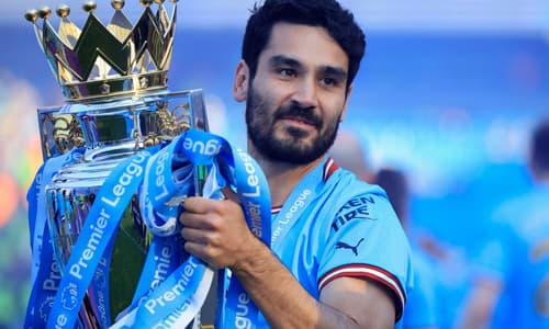Ilkay Gundogan lifts the Premier League trophy