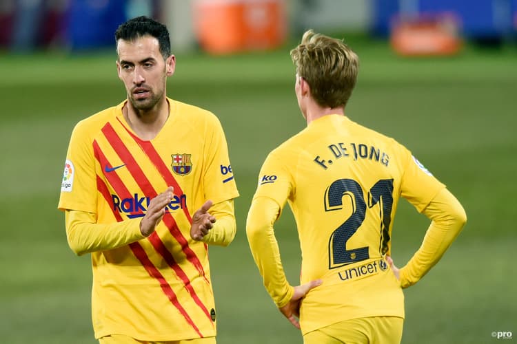 Sergio Busquets and Frenkie de Jong in a Barcelona LaLiga match.